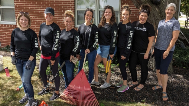 A Days of Caring team at work