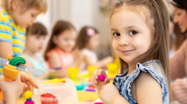 Children play together at daycare